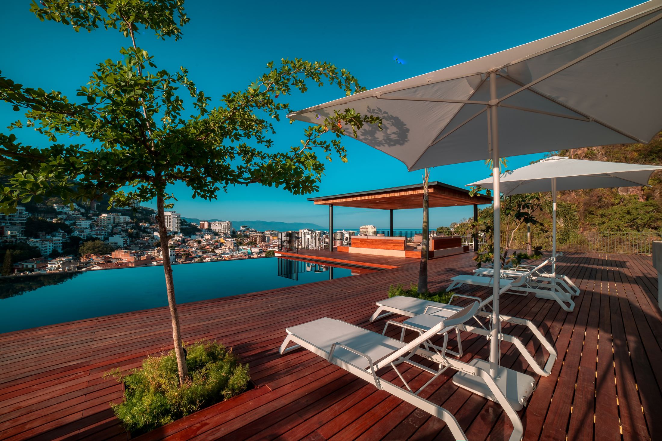 Rooftop pool at Oasis overlooking the river canyon, Puerto Vallarta