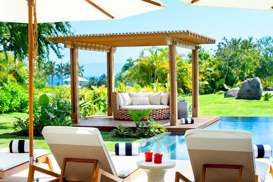 Pool and palapa lounge in the shared garden
