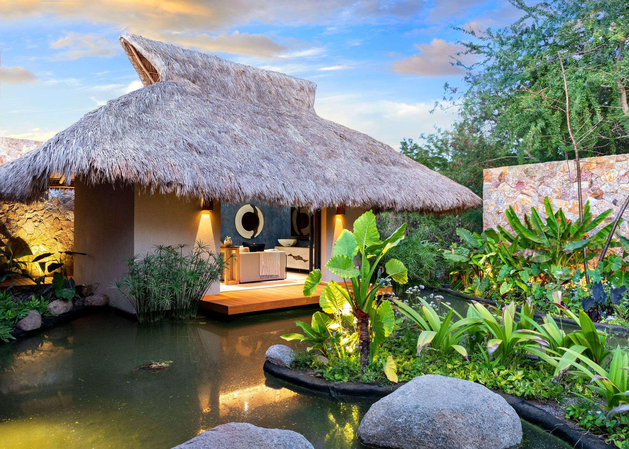 Palapa lounge over the koi pond at Reserva, Punta Mita