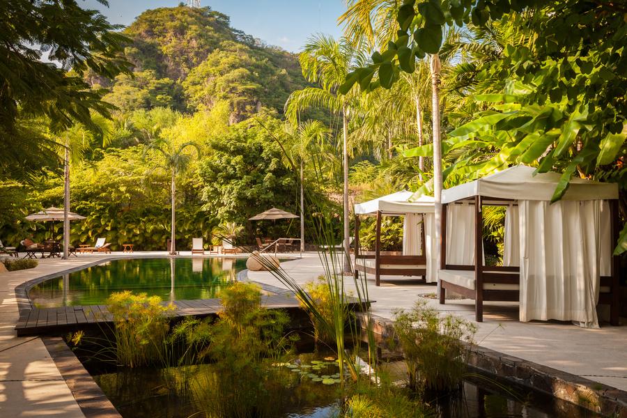 Garden pool deck with palapa at Rivera Cuale