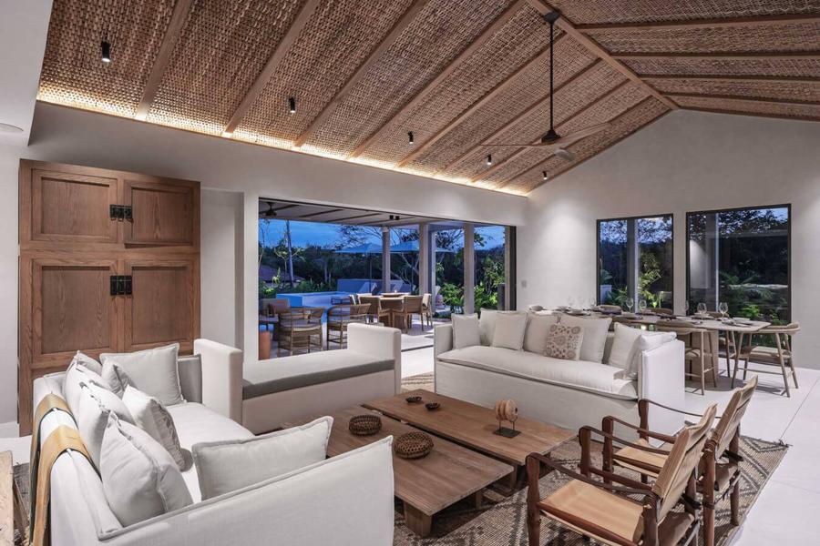 Living room with timber ceiling and garden views