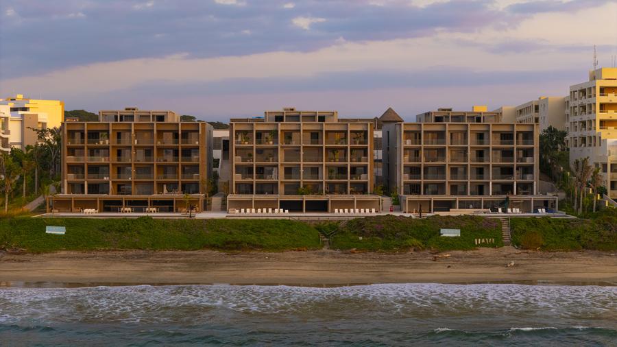Evening aerial of the beachfront buildings